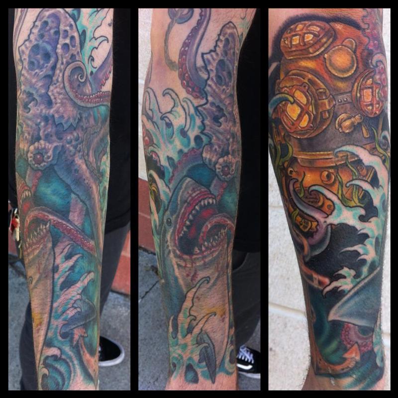 Underwater battle tattoo by Phil Robertson Tattoos
